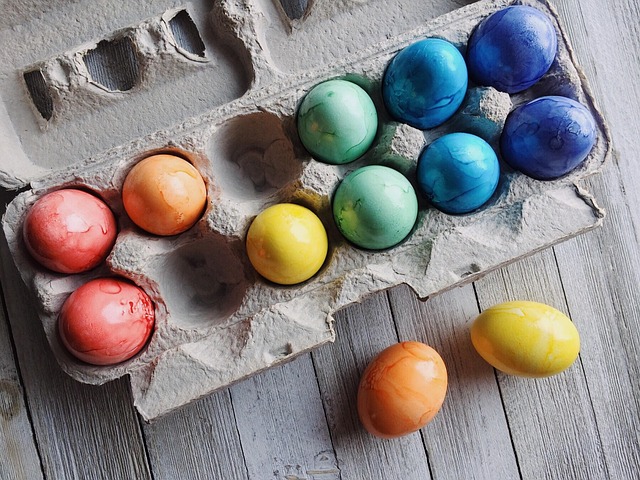 eggs in carton on farmhouse kitchen table with bright light
